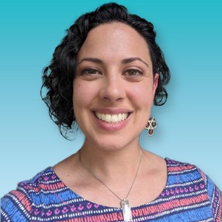 Leah Chaudhari with blue background